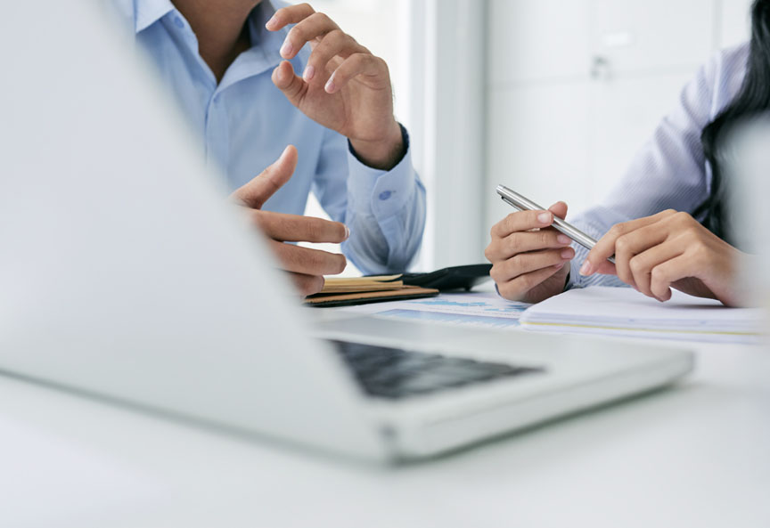 Business team working together with laptop and notebook